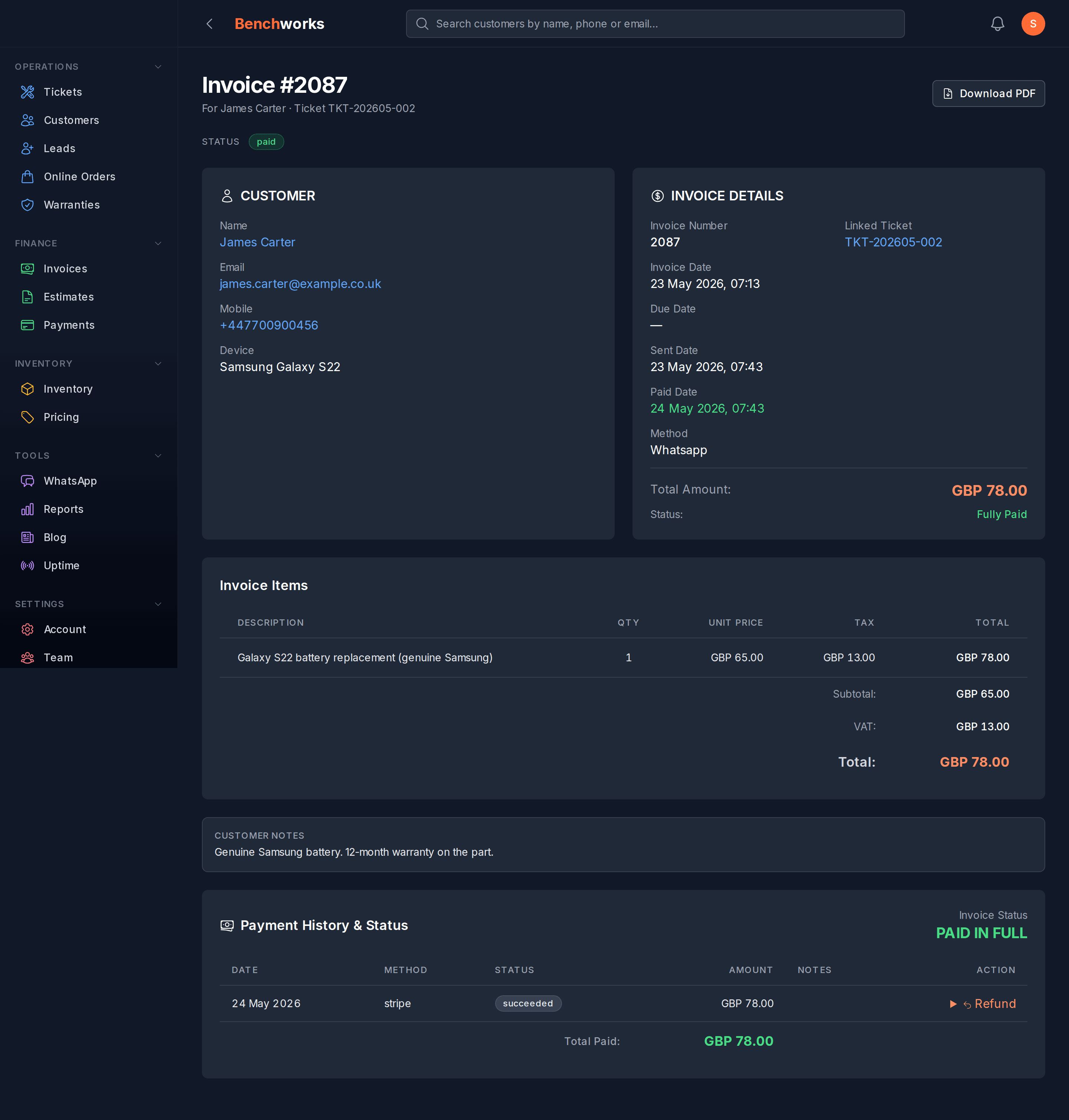 A paid invoice with payment history and a paid-in-full status.